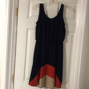 Short sleeved dress. In great condition. Navy blue, orange and tan. Size 8
